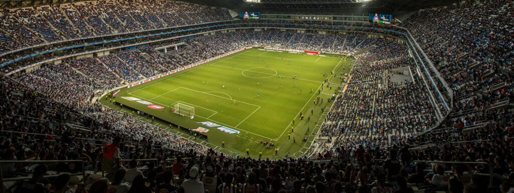 Illustration : Stade rempli de supporters de foot avant un match
